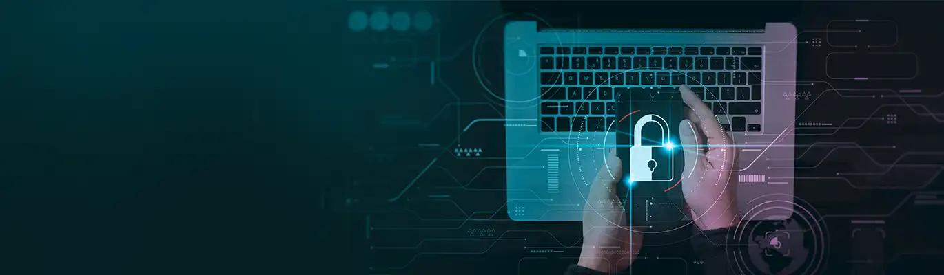 A security lock icon image pops up from a phone which is holded with hands above a laptop 