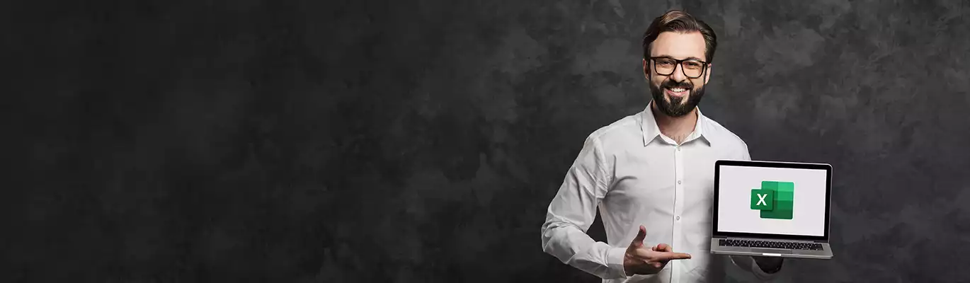 A professional in white shirt standing with a laptop which displaying microsoft excel on screen