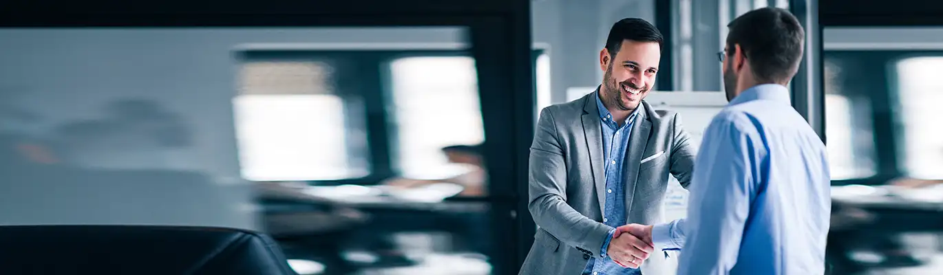 supervisory professionals handshake together after the meeting